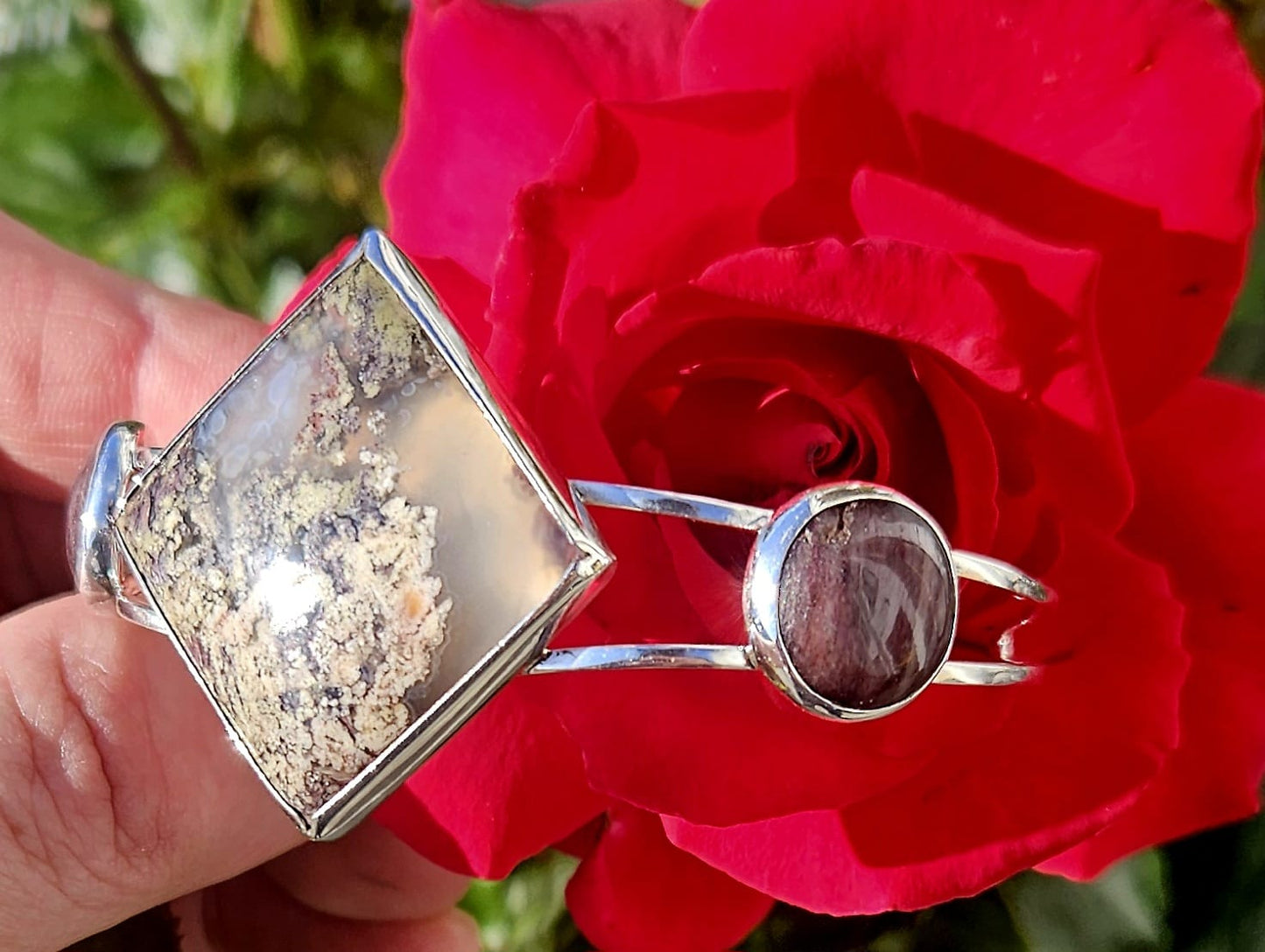 Sterling Silver Cuff bracelet with a 27x27mm square cabochon of Indonesian picture moss agate, flanked by a pair of purple New Zealand Aroha stones cut to 14mm round cabochons and set in sterling silver, showing flanking stone.
