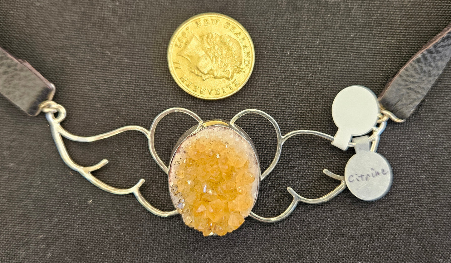 Large (100mm) sterling silver Heart-Wings choker-Necklace with Citrine Druzy and leather strap with NZ one dollar coin for size comparison.