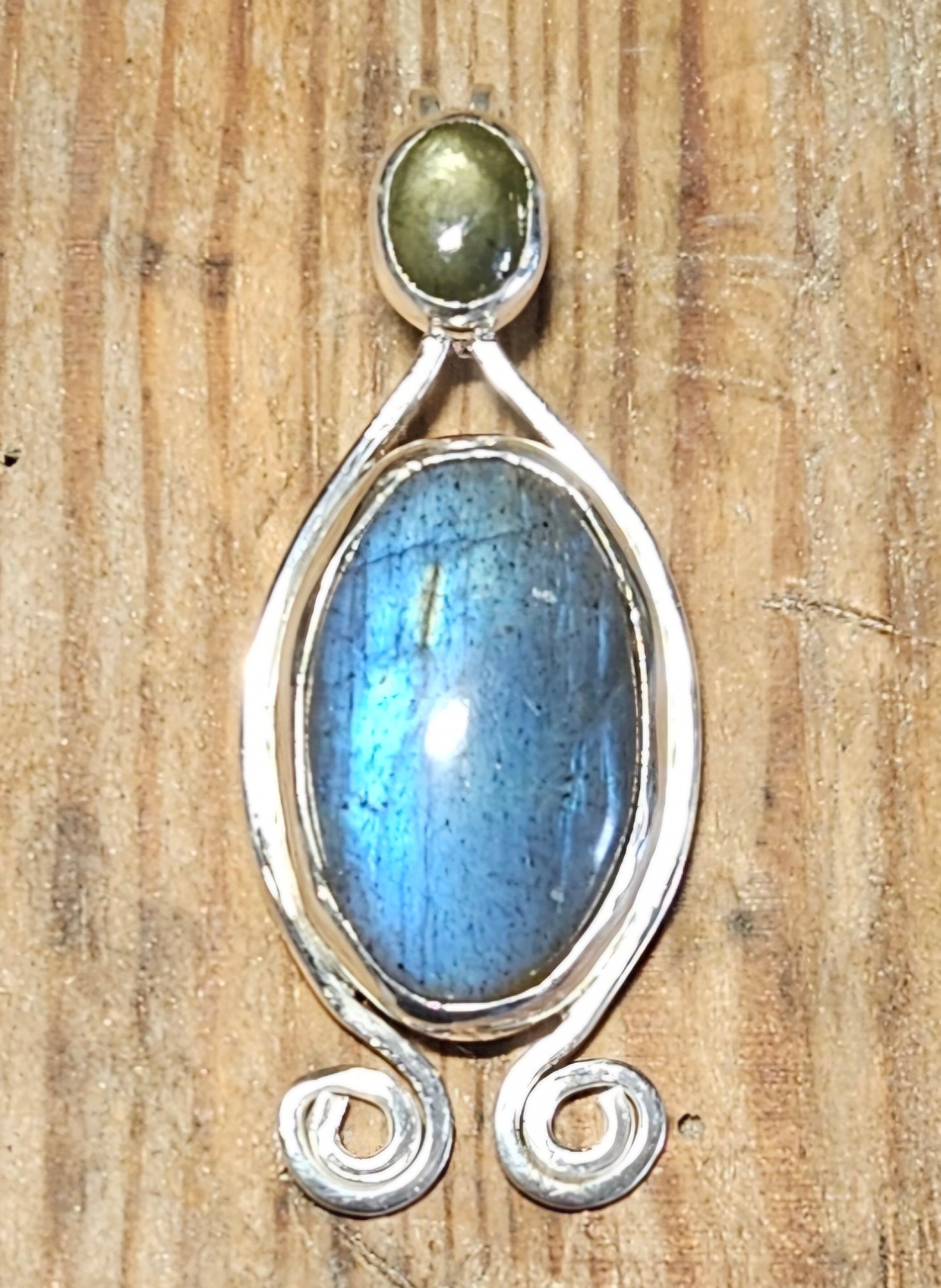 Radiant Labradorite pendant in sterling silver with glowing black star sapphire with a 18 inch sterling silver chain, Pendant alone.