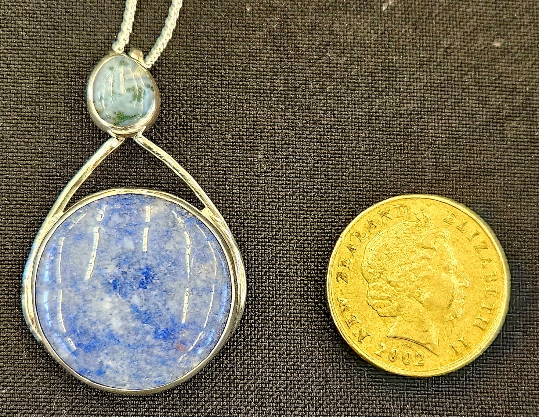 Natural Blue Quartz pendant with Moss Agate in Sterling silver with 18 inch sterling silver chain with NZ one dollar coin for size comparison.