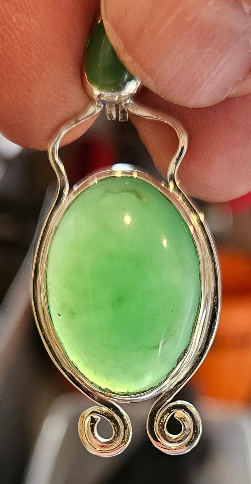 Australian Chrysoprase in sterling silver pendant with 18 inch sterling silver chain, back-lit.