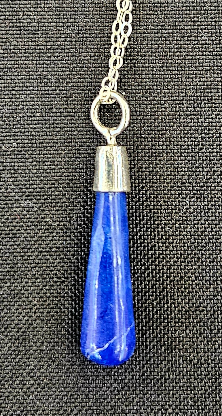 Lapis Lazuli pendulum with sterling silver setting, set to be worn as a necklace, so it's always handy, with a sterling silver chain.