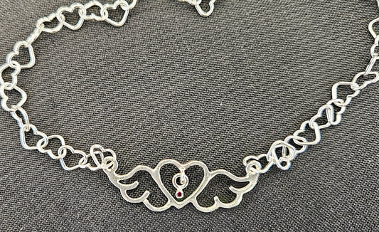 Small (40mm wide) Heart-Wing pendant with a ruby charm, all in solid sterling silver and a solid sterling silver heart chain.