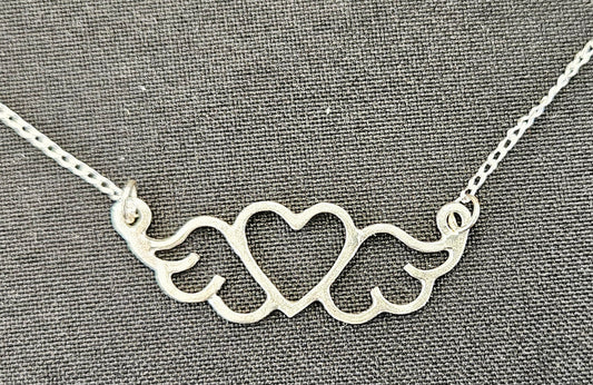Small (40mm wide) Heart-Wing pendant in solid sterling silver and a solid sterling silver fine chain.
