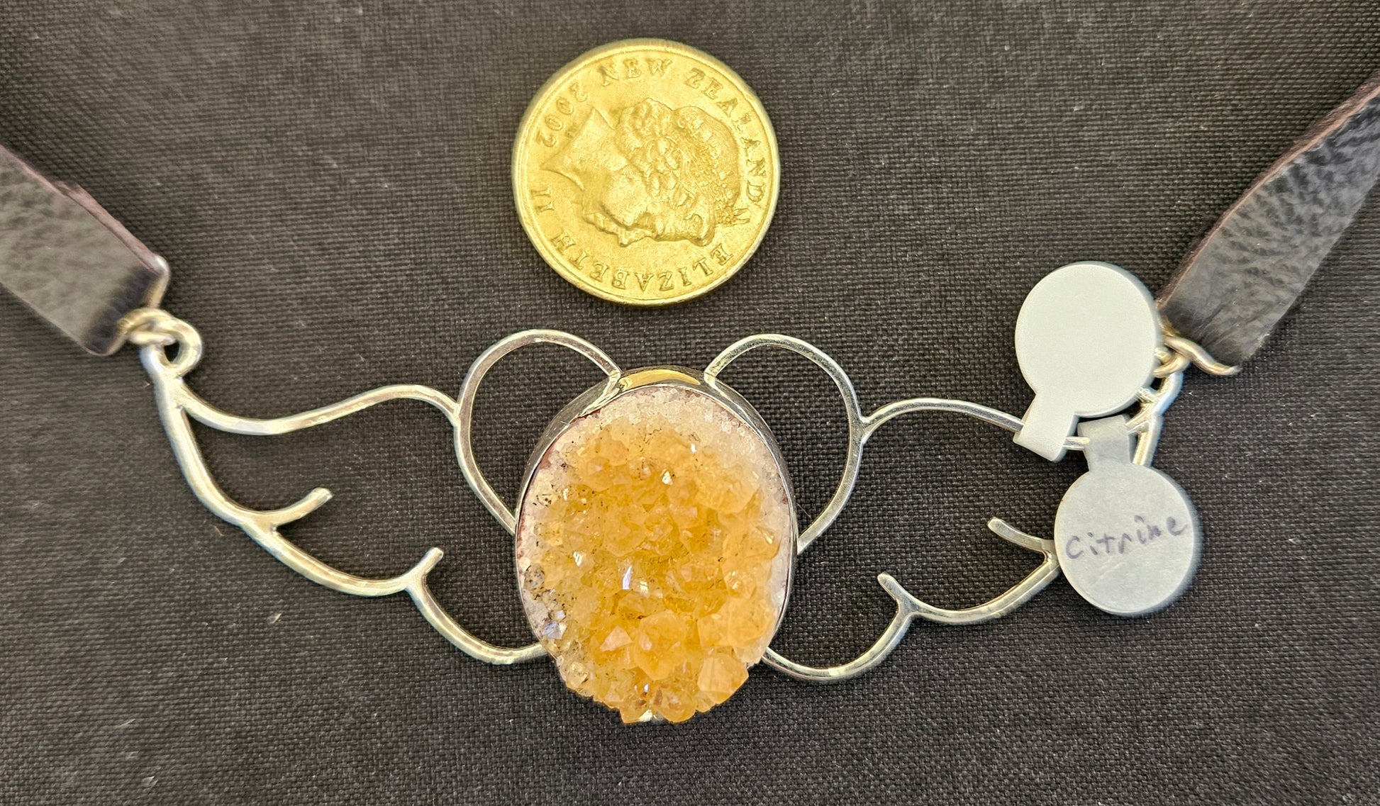 Large (100mm) sterling silver Heart-Wings choker-Necklace with Citrine Druzy and leather strap with NZ one dollar coin for size comparison.