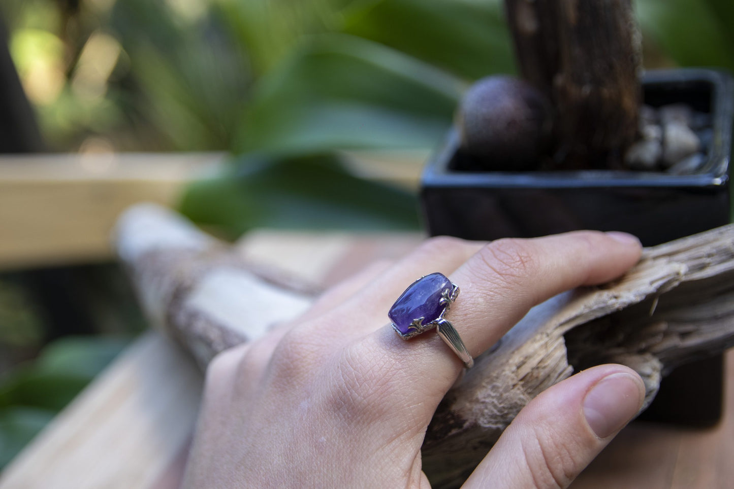 Hand cut Brazilian amethyst, unique elongated hexagon shape, set in silver plated art-deco styled adjustable ring, side view