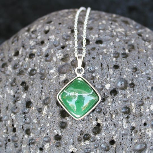 Necklace with Botswana Jade (Green Aventurine), hand polished to a 15x15mm square and set in a silver plated setting with 19 inch chain.
