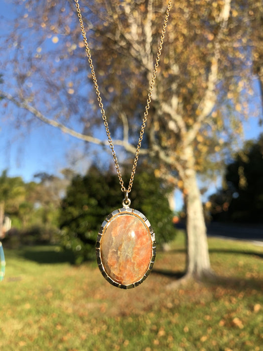 Necklace with lovely Jasper from Scotland, Subtle pink and grey tones, hand polished to a 25x18mm cabochon and set in a gold-plated setting with 19 inch chain on meadow