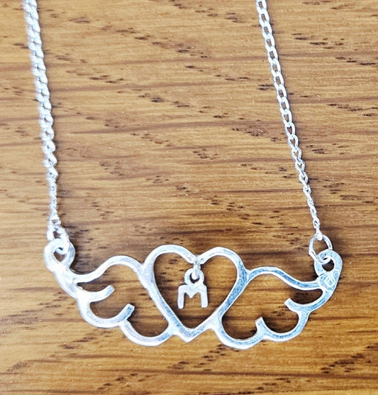 Small (40mm wide) Heart-Wing pendant with a letter "M" charm, for Mother, all in solid sterling silver and a solid sterling silver chain. This is a perfect Mother's Day gift.